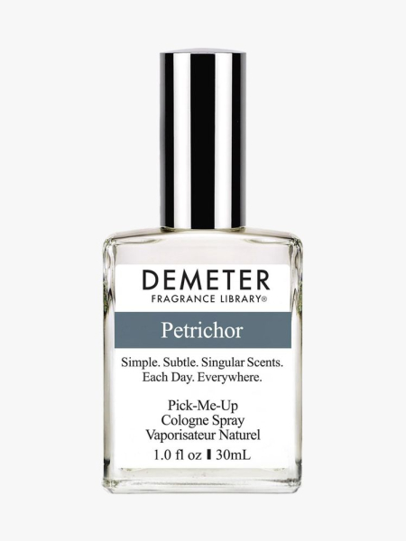 Bottle of Demeter Fragrance Library Petrichor Cologne Spray with black cap on light gray background