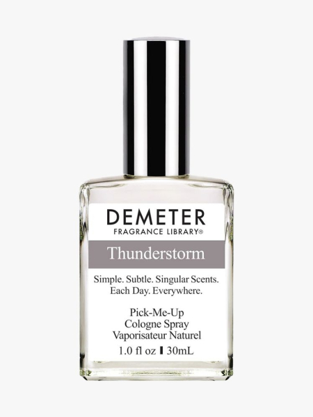 Bottle of Demeter Fragrange Library Thunderstorm Cologne Spray with black cap on light gray background